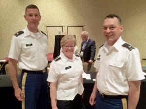 LTG Dyson, MILDEP for ASA(FM&C) poses alongside the AFMO Task Force leadership after a successful PDI Zero Day briefing. From left to right: COL John T. Vogel, LTG Karen E. Dyson, and COL Andrew J. McConachie.